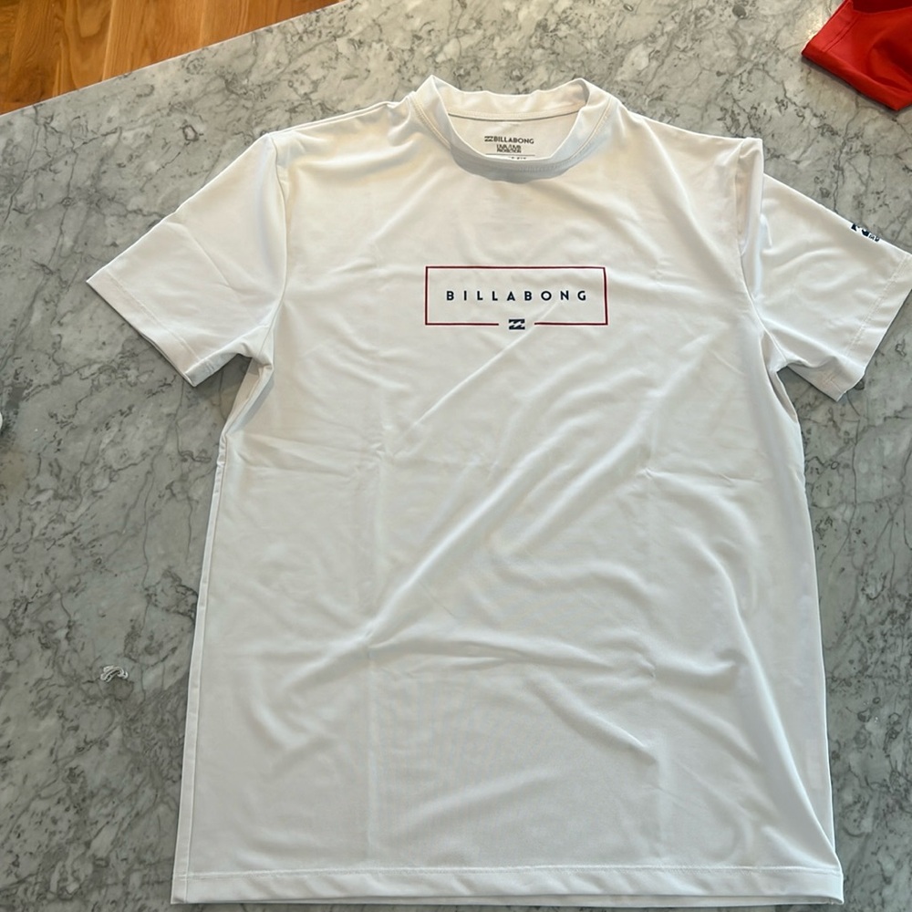 Billabong size 14 youth swim tee.